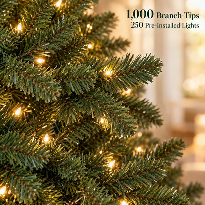 Close-up of green artificial tree branch tips and pre-installed lights